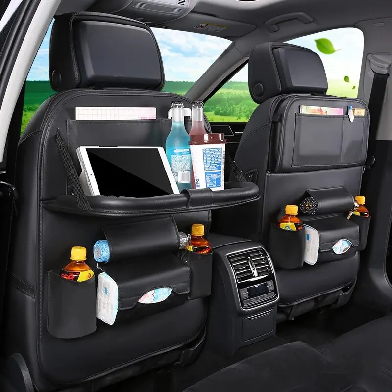 Organisateur de voiture noir en cuir PU avec tablette pliante pour rangement optimal et confort en voyage.