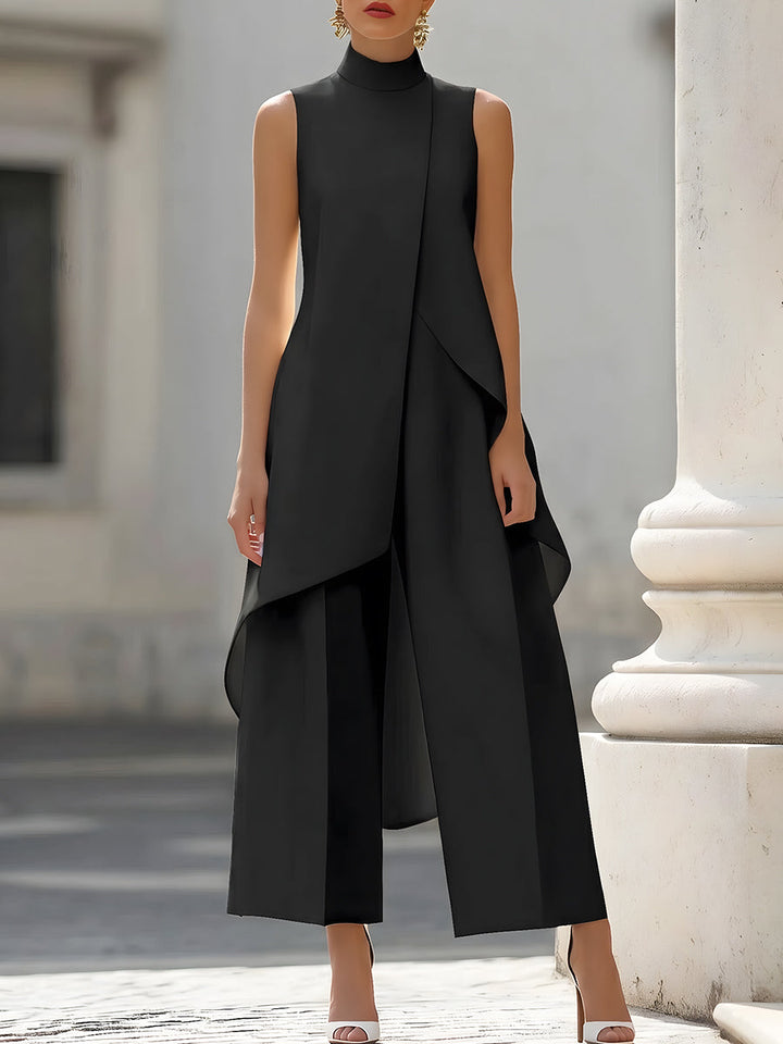 Combinaison soirée femme, col montant asymétrique, pantalon large. Style moderne et sophistiqué.
