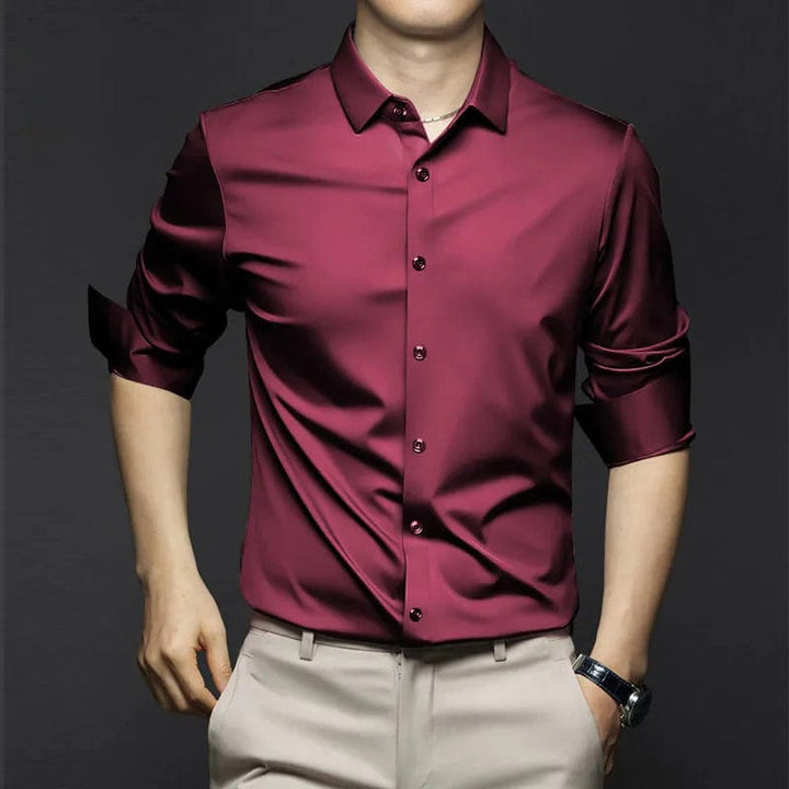 Détail du poignet et des boutons de la chemise homme manches longues, coupe slim élégante et tissu sans plis confortable.