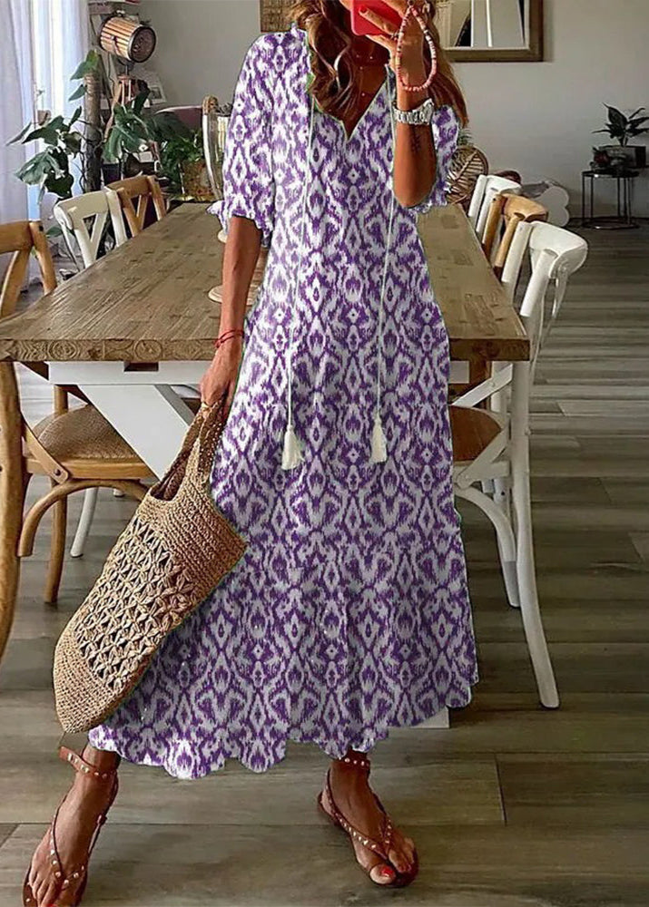 Robe longue d'été femme imprimée florale, parfaite pour vacances, plage ou sortie décontractée. Style estival.
