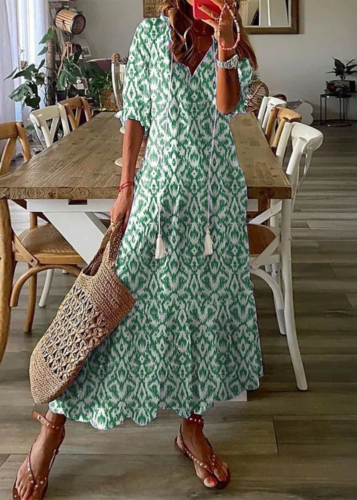 Élégante robe femme longue fleurie, motif floral vibrant, ceinture ajustable à la taille. Parfaite mode été chic.