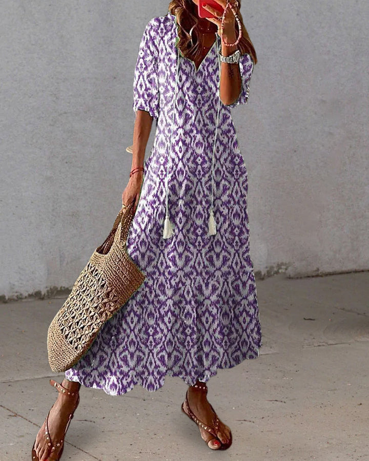 Robe d'été bohème fluide pour femme, facile à porter en vacances, coupe décontractée et confortable.
