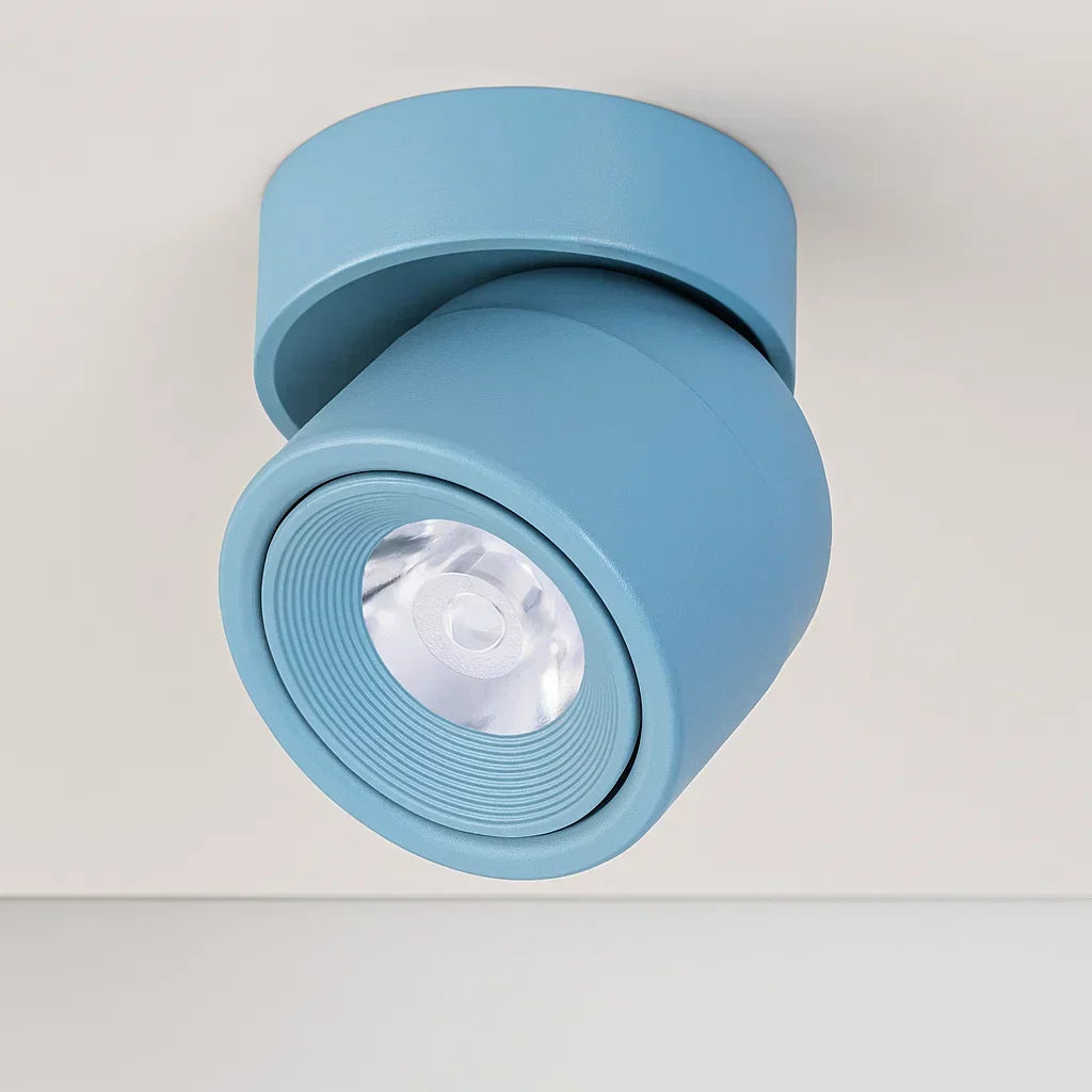 Projecteur LED plafond orientable, lumière dimmable. Design moderne pour un éclairage d'ambiance intérieur.
