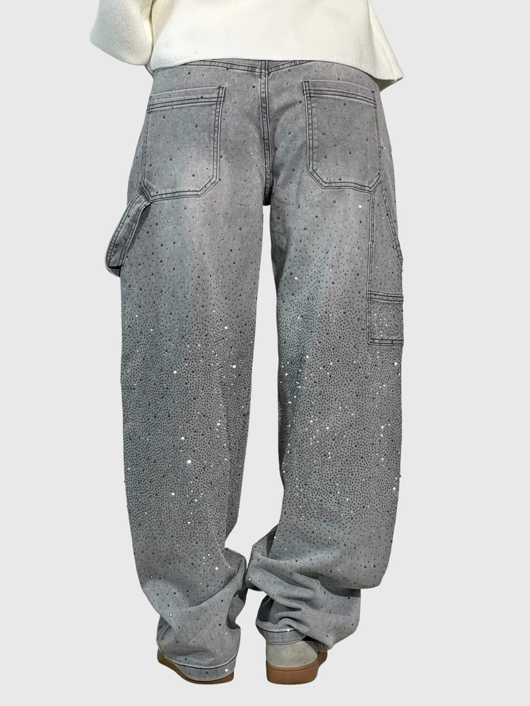Pantalon femme tendance, design scintillant, coupe confortable et lâche pour un glamour quotidien.