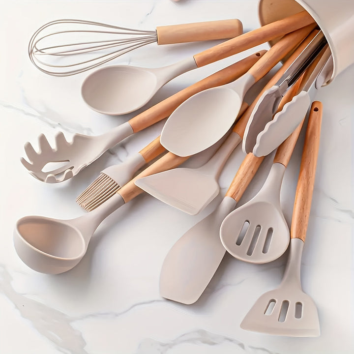 Set de cuisson en silicone noir, essentiel pour tout chef. Rangement inclus.