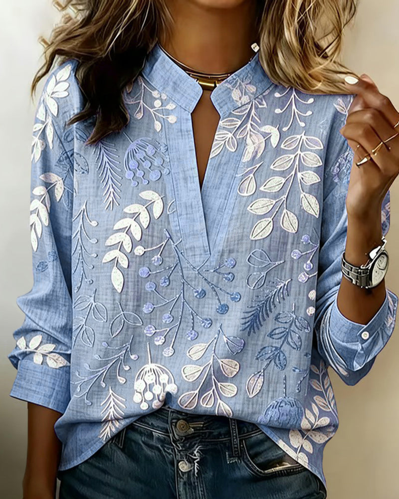 Haut femme floral élégant, coupe fluide, col V, parfait pour le quotidien et l'été.