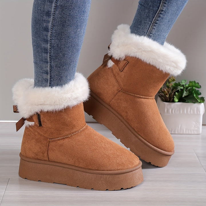 Bottines femme hivernales, design moderne et doublure chaude pour un confort thermique supérieur.