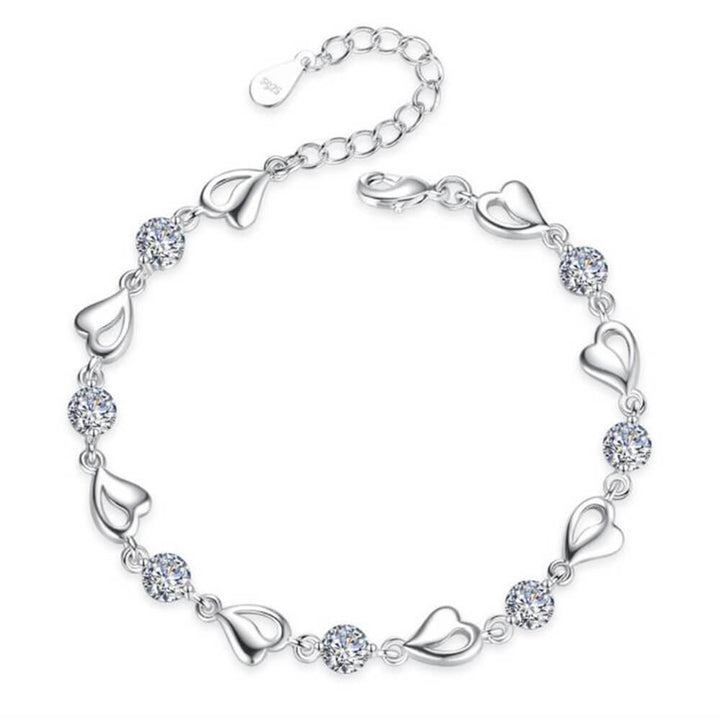 Bracelet élégant en argent 925 avec pendentif cœur. Bijou féminin et chic pour toutes occasions.