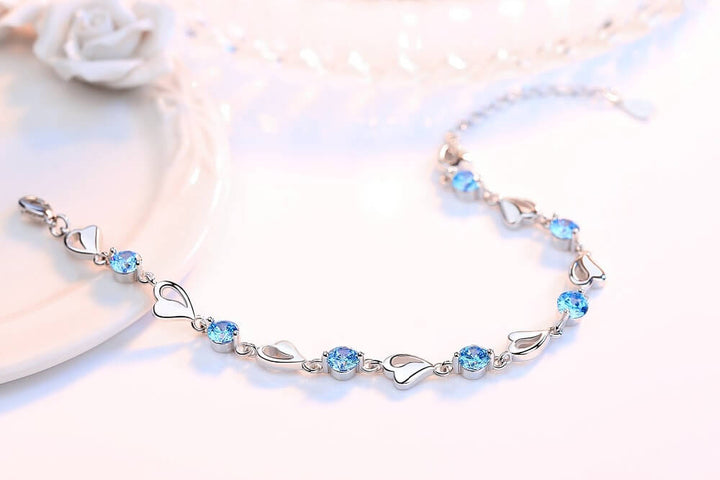 Bracelet en argent 925 pour femme, orné d'un délicat cœur. Bijou chic et intemporel pour toutes.