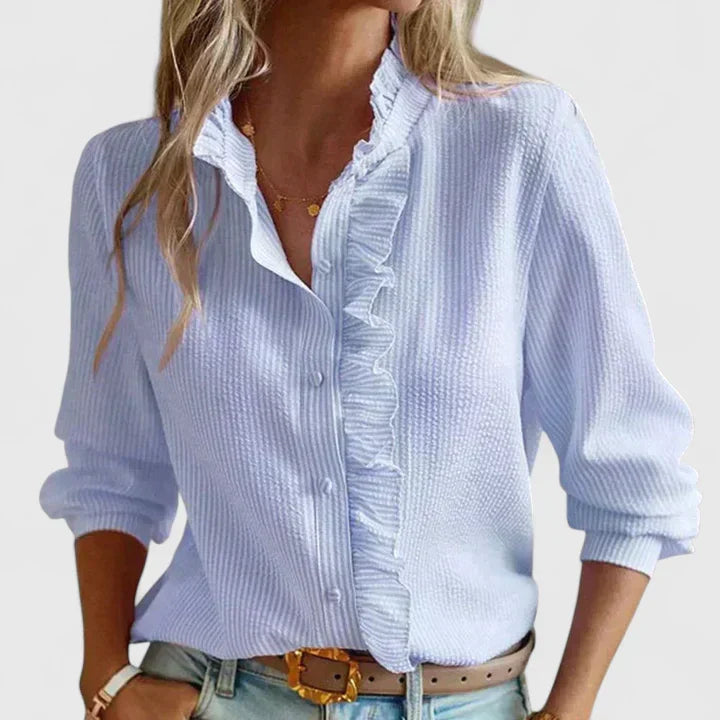 Blouse femme Marcelina élégante, avec volants et manches longues, parfaite pour le bureau ou un look casual chic.