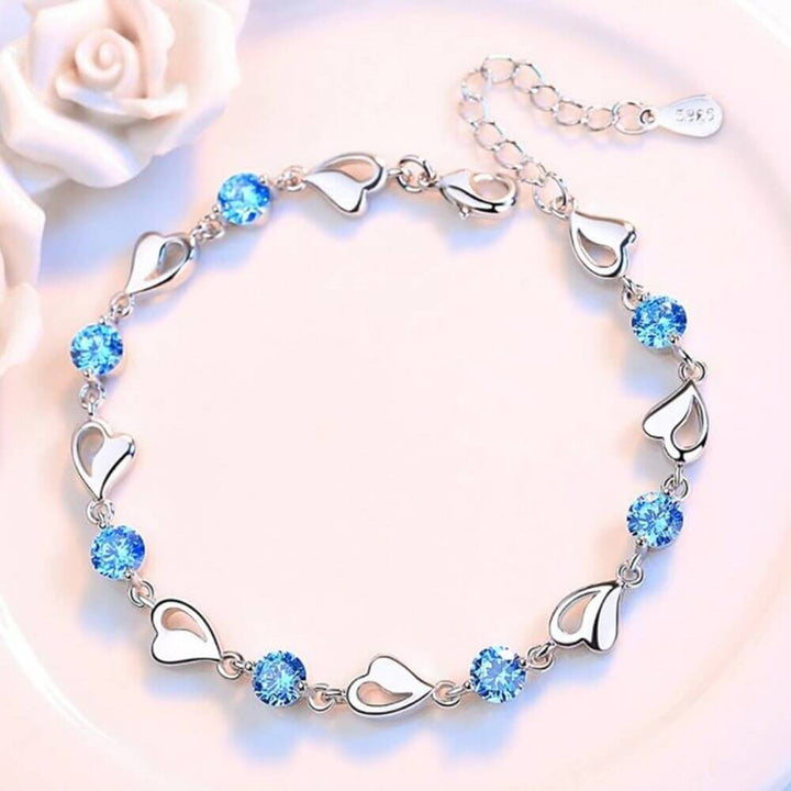 Cadeau chic: Bracelet cœur en argent sterling 925 pour femme. Bijou délicat et résistant, parfait au quotidien.