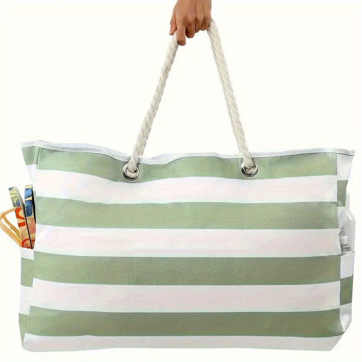 Sac femme grand format, rayé pour la plage, avec poignées en corde robustes.
