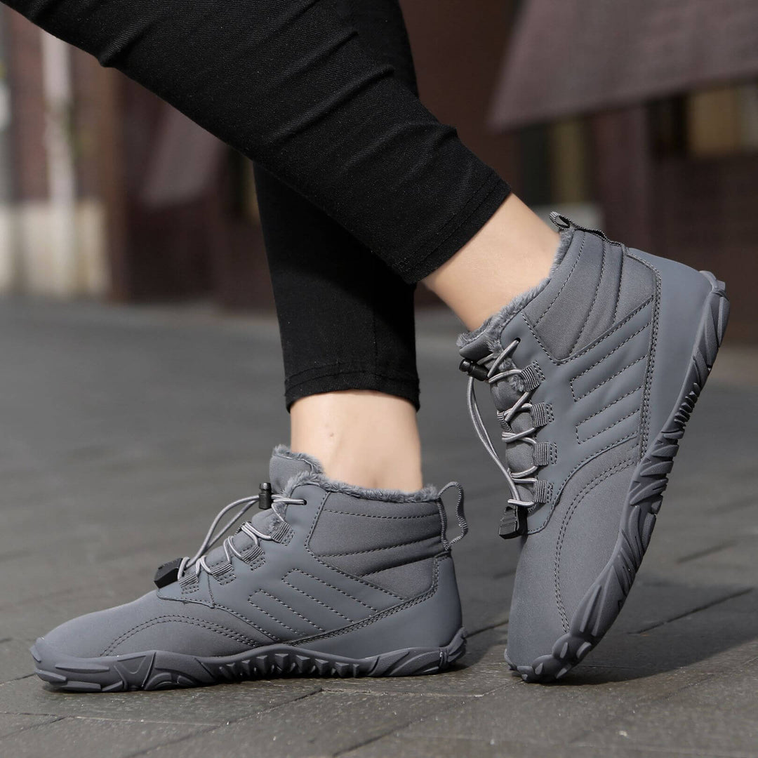 Chaussures pieds nus imperméables pour homme et femme, parfaites pour neige et conditions humides en extérieur.