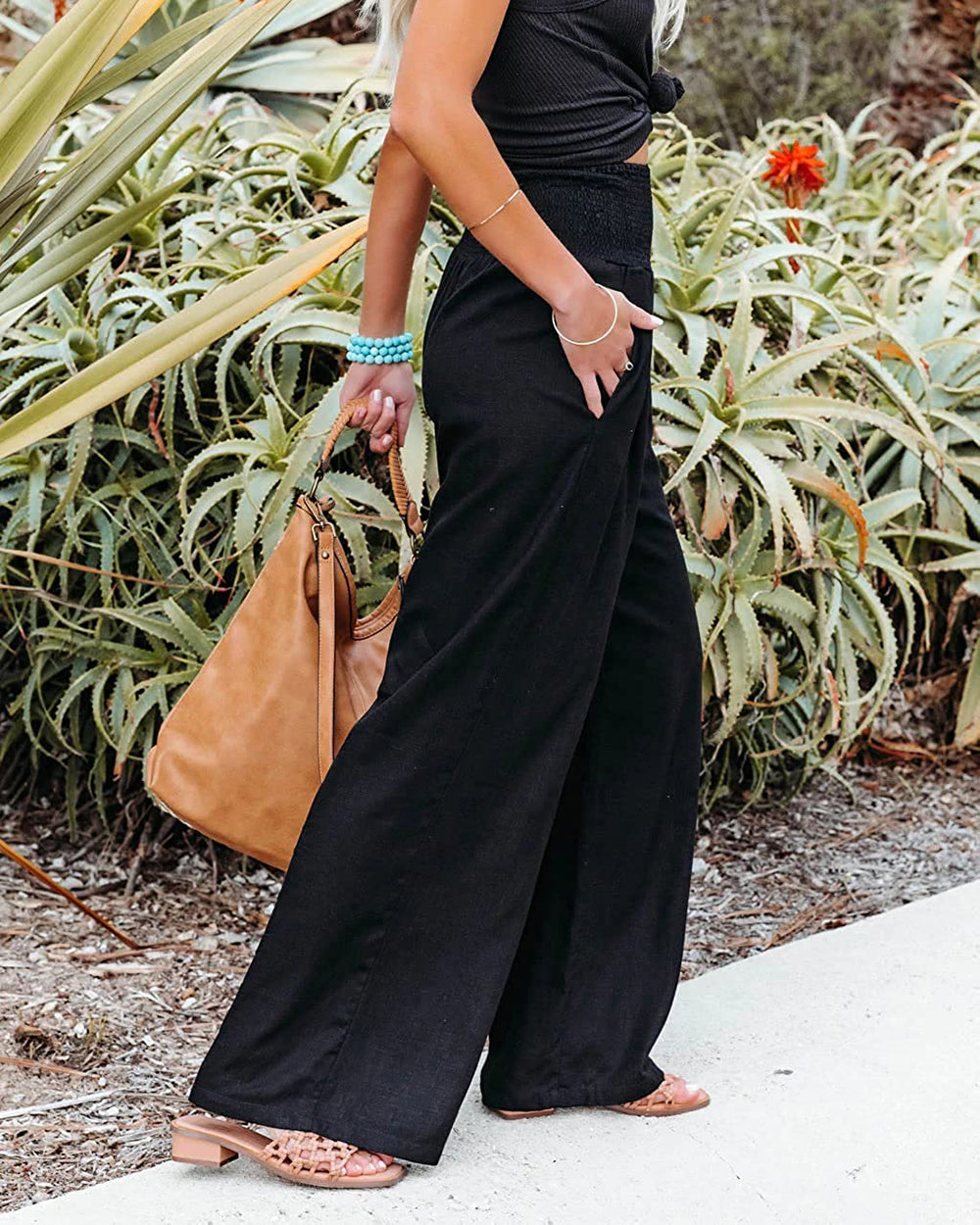 Pantalon palazzo terracotta femme, taille élastique, jambes larges, style estival moderne et fluide.