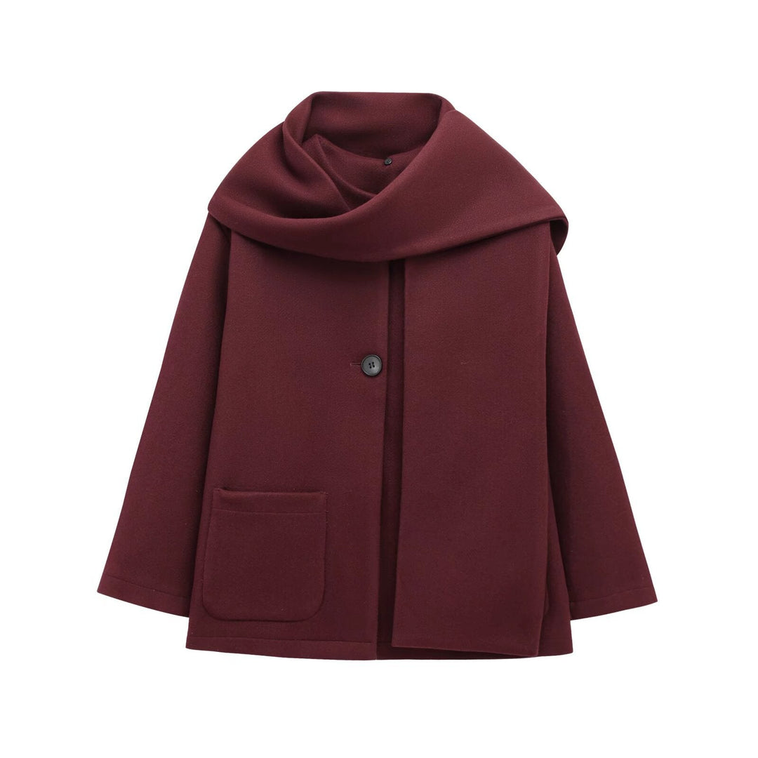 Manteau femme élégant, col enveloppant. Idéal pour un look français sophistiqué en automne ou hiver.