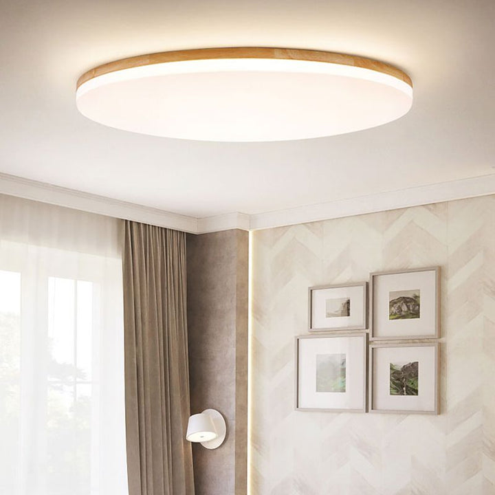 Plafonnier LED design pour salle à manger, éclairage moderne et économe en énergie.
