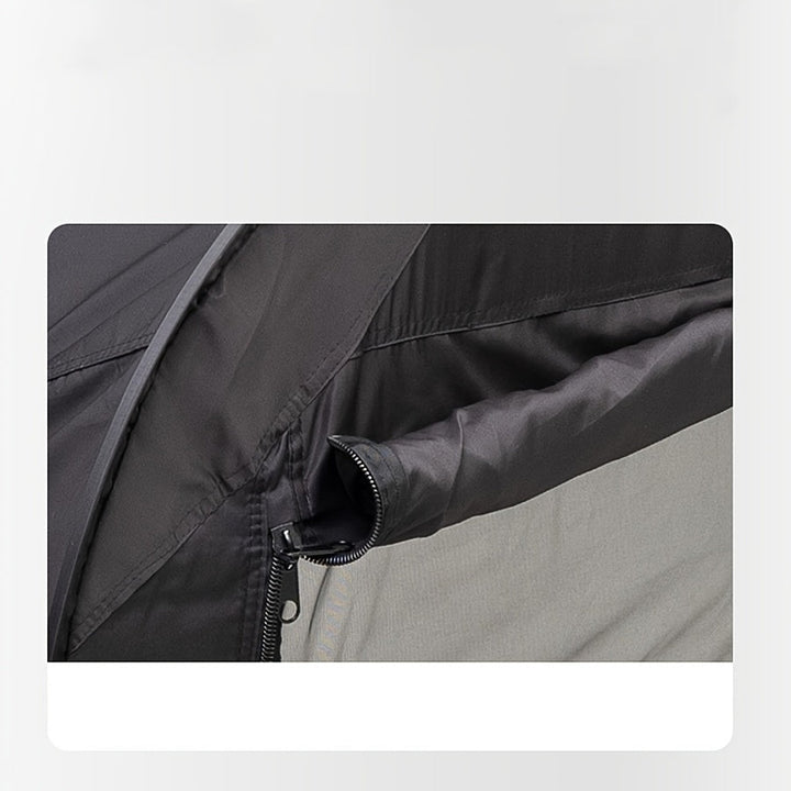 Lit de tente noir robuste pour l'extérieur, offrant confort et protection insectes. Parfait pour le camping.