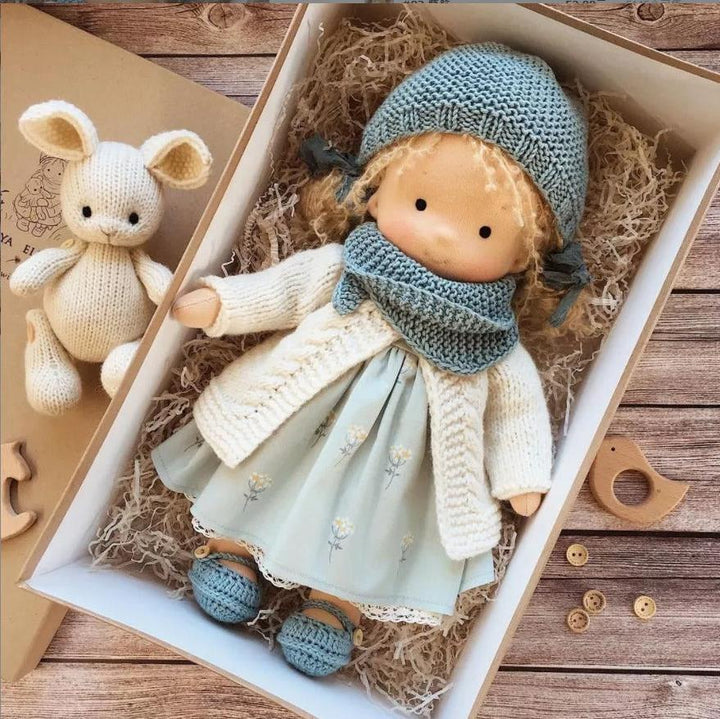 Jouet pédagogique en coton: marionnette pour l'éveil des sens et la narration.