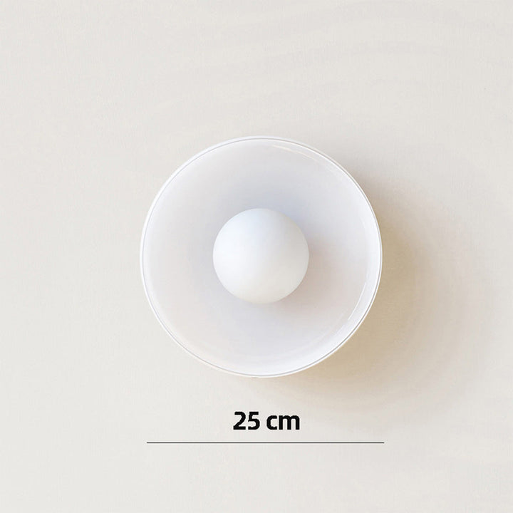 Éclairage intérieur LED rond, design moderne, met en valeur salon et cuisine.