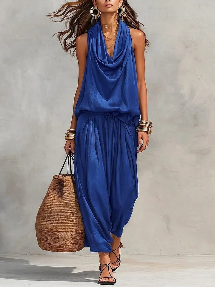 Ensemble femme élégant pour printemps-été: top drapé et pantalon ample fluide. Tenue chic et confortable.