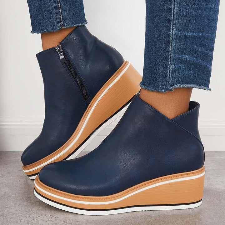 Vue frontale des bottes Leony élégantes. Design moderne et chic, chaussures confortables pour femmes.