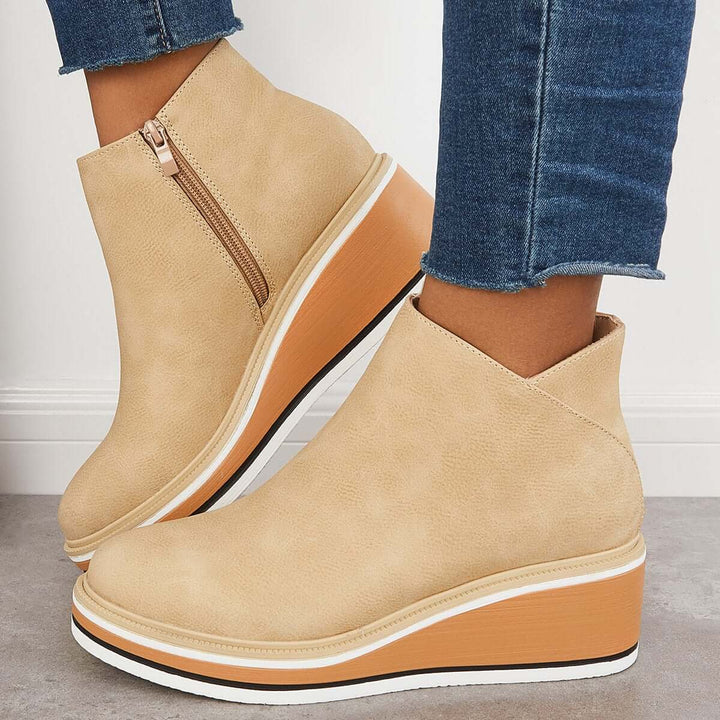 Dos des bottes Leony pour femmes. Couture raffinée, apporte une touche stylée à toute tenue hivernale.