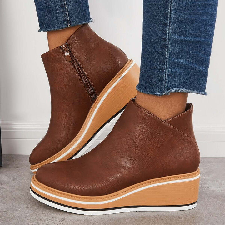 Détail texturé des bottes Leony pour femmes. Cuir lisse, conception chic et moderne pour une élégance intemporelle.