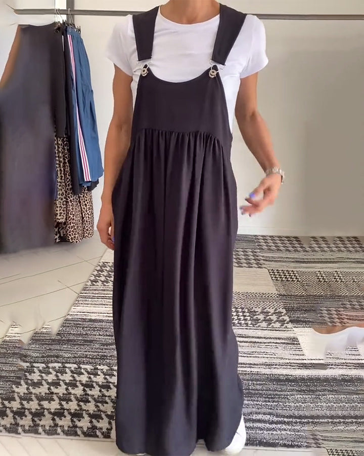 Robe élégante violette coupe maxi, style salopette chic, mode femme printemps-été.