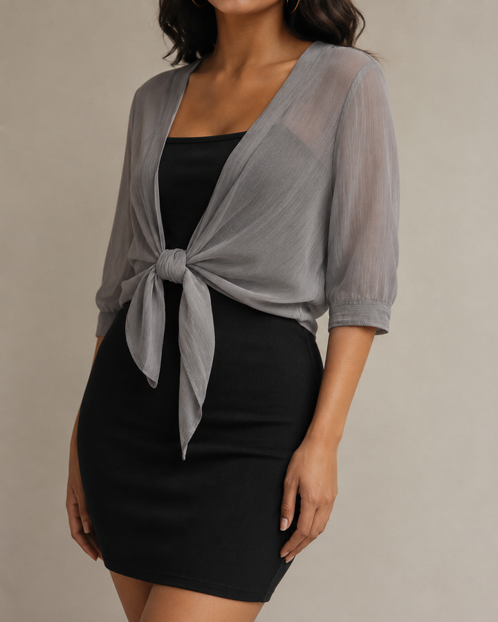 Haut femme élégant et léger, devant ouvert. Polyvalent pour mode féminine, chemise fluide confortable.