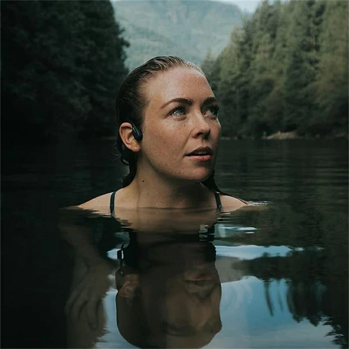 Écouteurs sportifs ouverts sans fil, permettant d'entendre l'environnement tout en écoutant de la musique.