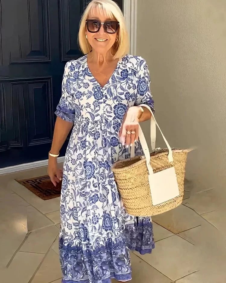 Robe longue florale élégante pour femme avec col en V, parfaite pour l'été et le printemps. Mode estivale fluide.