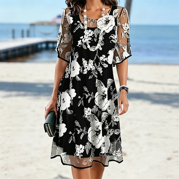 Robe florale fluide en chiffon pour femme, élégante et confortable, grande taille, parfaite pour l'été.