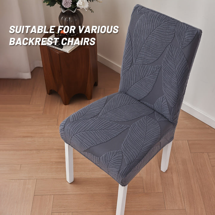 Housse de protection chaise motif feuille, installation facile, tissu doux et résistant.