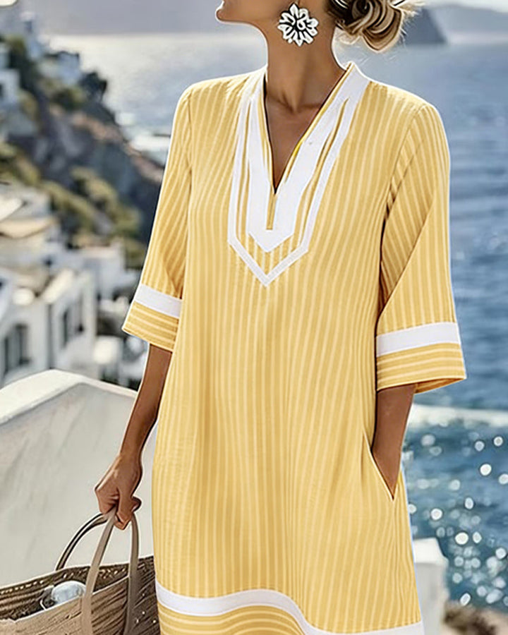 Vêtement femme: Robe rayée à manches courtes, col V. Style décontracté et chic, idéale pour l'été.