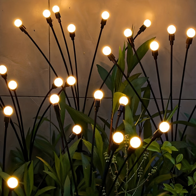 Lumières solaires LED effet luciole, parfaites pour décorer terrasse et balcon. Éclairage extérieur ambiance fête.