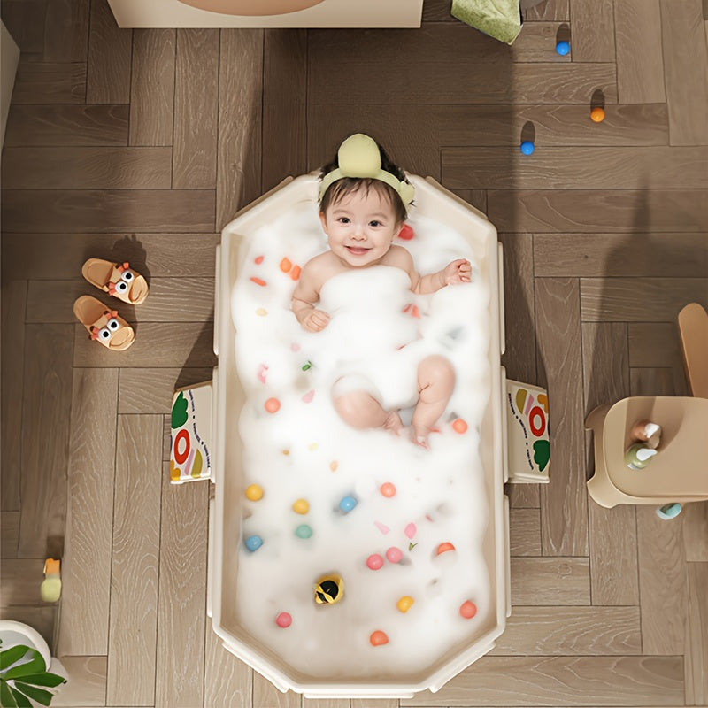 Baignoire pliante pour bébé, couleurs blanc et vert, avec bouchon de vidange pour un nettoyage rapide.
