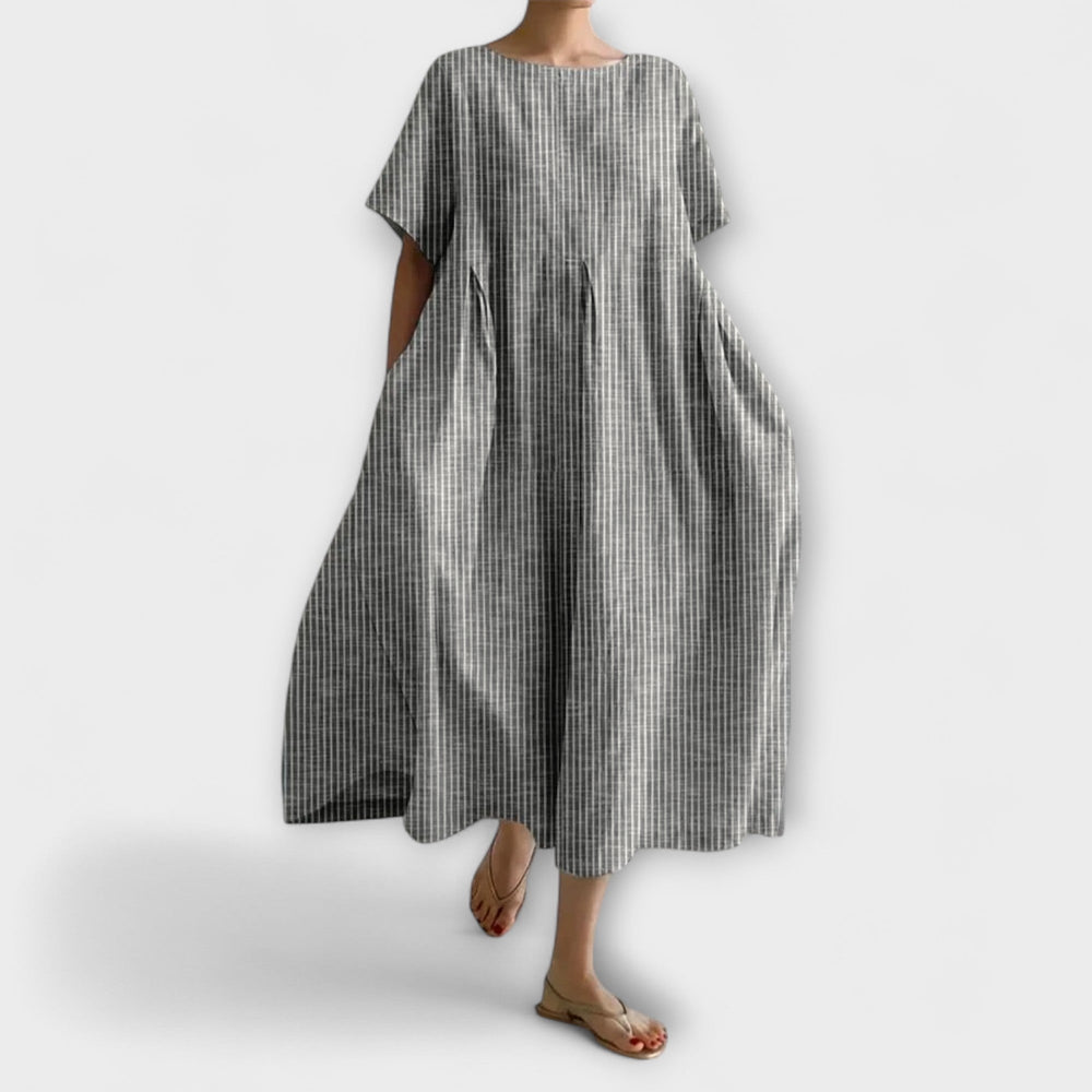 Robe longue femme fluide et confortable, parfaite pour un look décontracté chic. Disponible en plusieurs couleurs.