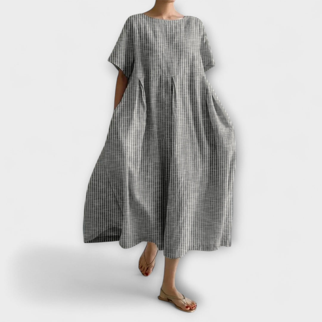 Robe longue femme fluide et confortable, parfaite pour un look décontracté chic. Disponible en plusieurs couleurs.
