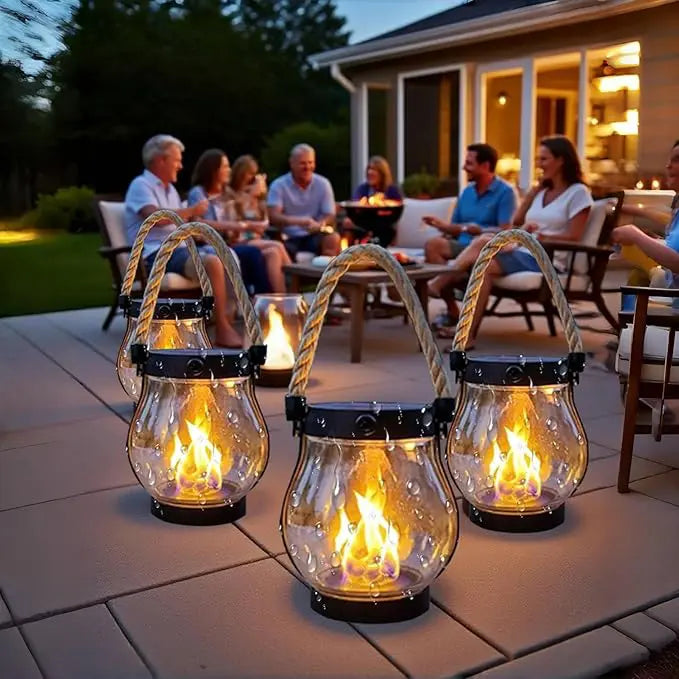Lumière d'ambiance extérieure, lanterne solaire flamme LED pour terrasses, s'allume automatiquement et résiste.