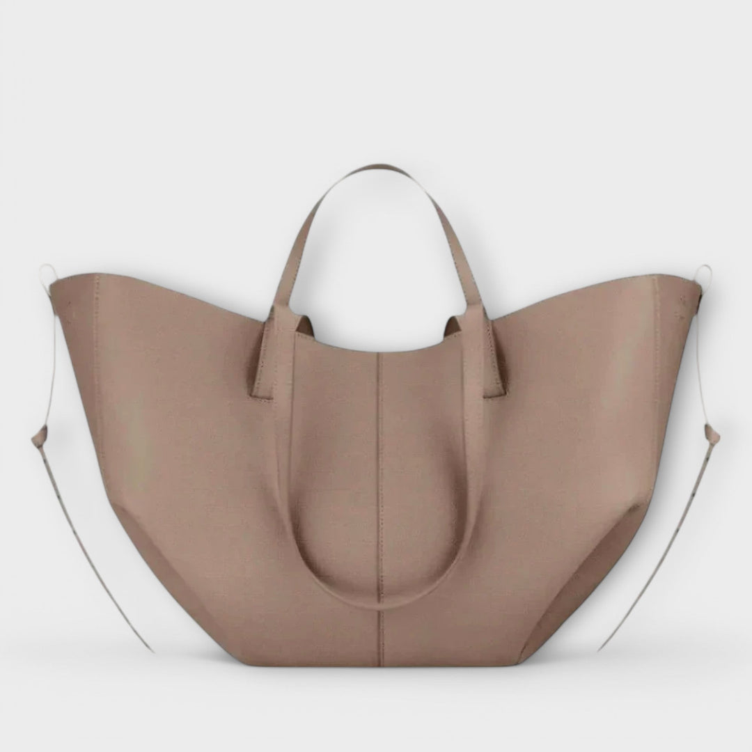 Sac à main élégant pour femme en simili cuir, parfait pour un look chic et quotidien.