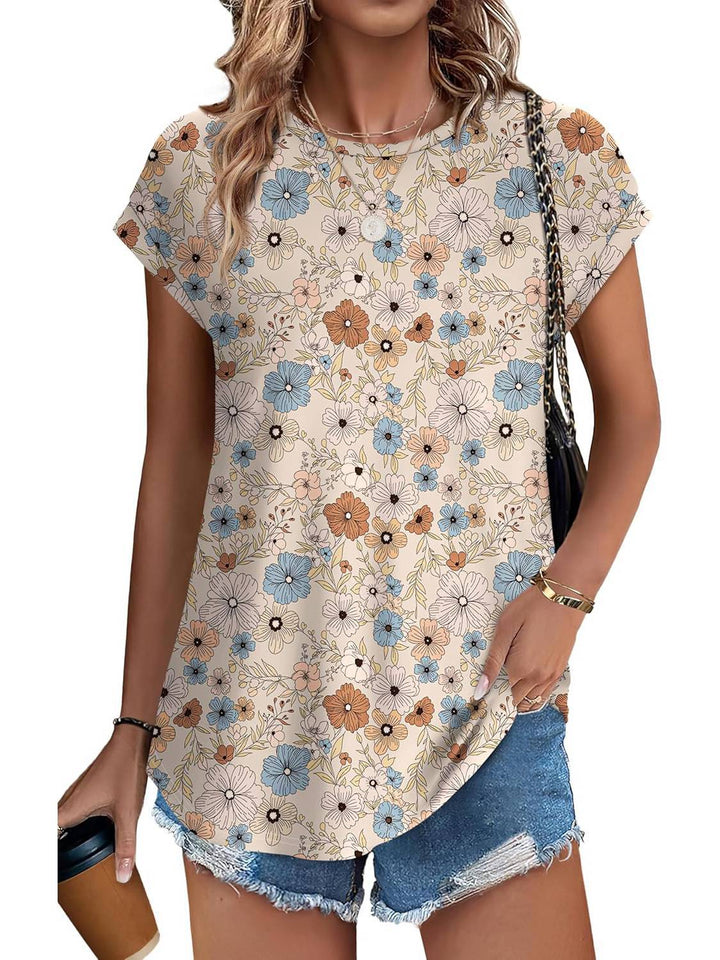 Gros plan sur l'imprimé floral vibrant d'une blouse femme fluide et élégante.