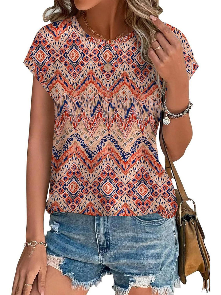 Blouse femme imprimée fluide, style printemps-été, ajoutant une touche d'élégance quotidienne.