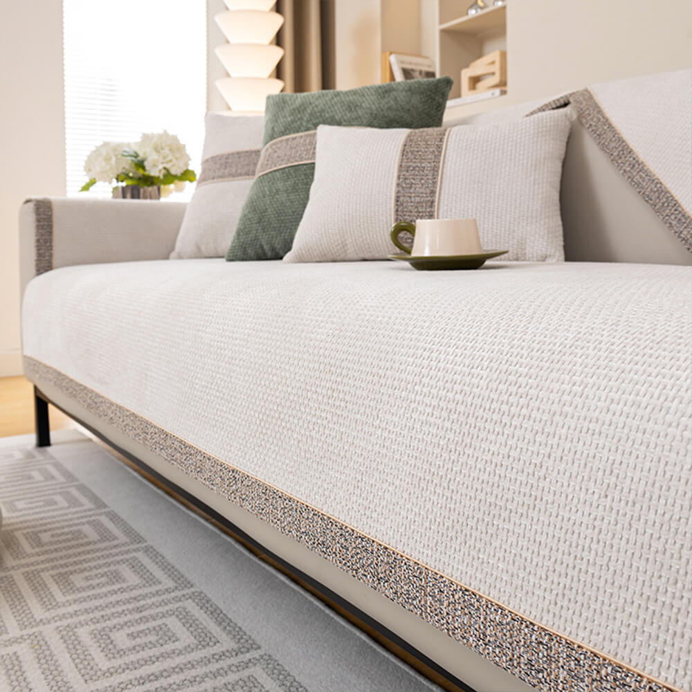Housse de protection canapé, facile à installer et à laver, pour un style intérieur durable et renouvelé.