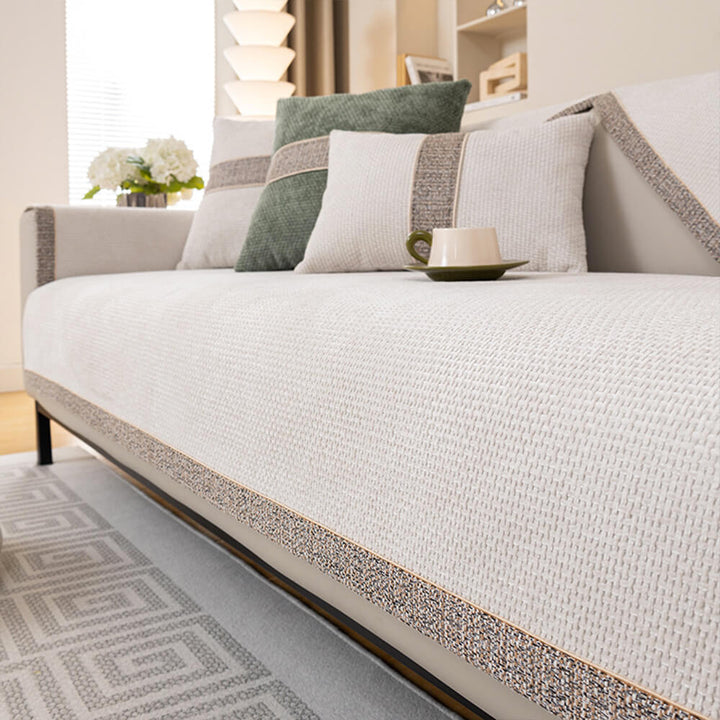 Housse de protection canapé, facile à installer et à laver, pour un style intérieur durable et renouvelé.