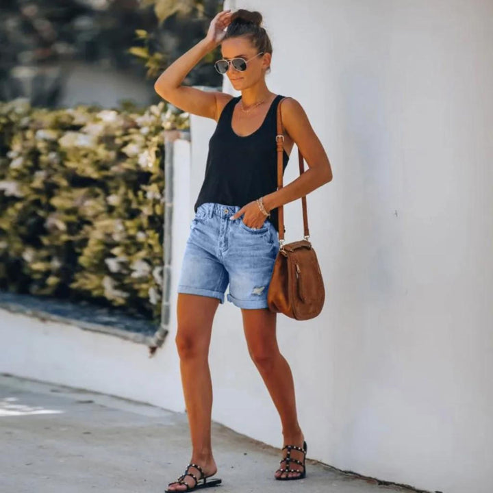 Short femme élégant et décontracté, taille haute avec poches. Indispensable pour un été confortable et stylé.