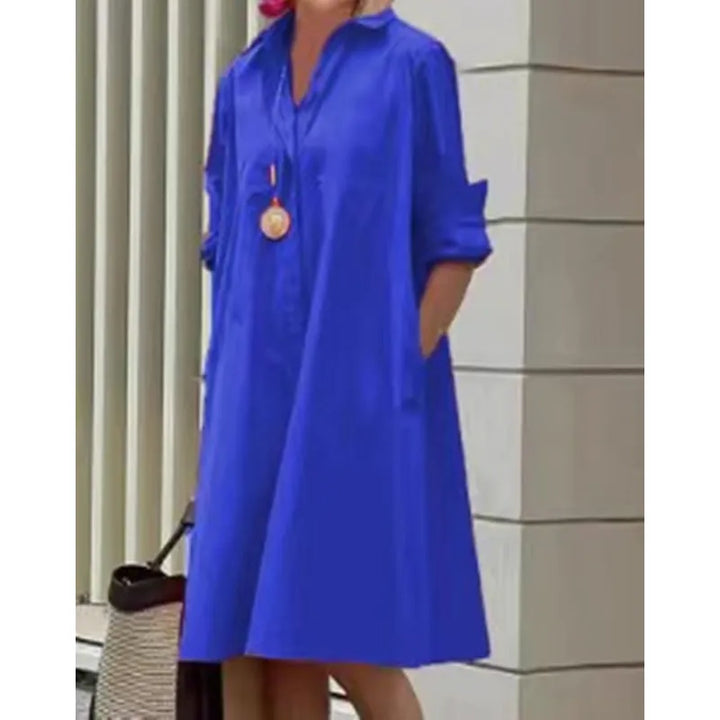 Vêtement femme moderne : robe midi à coupe droite avec un design effet 3D tendance, idéale pour un look chic.