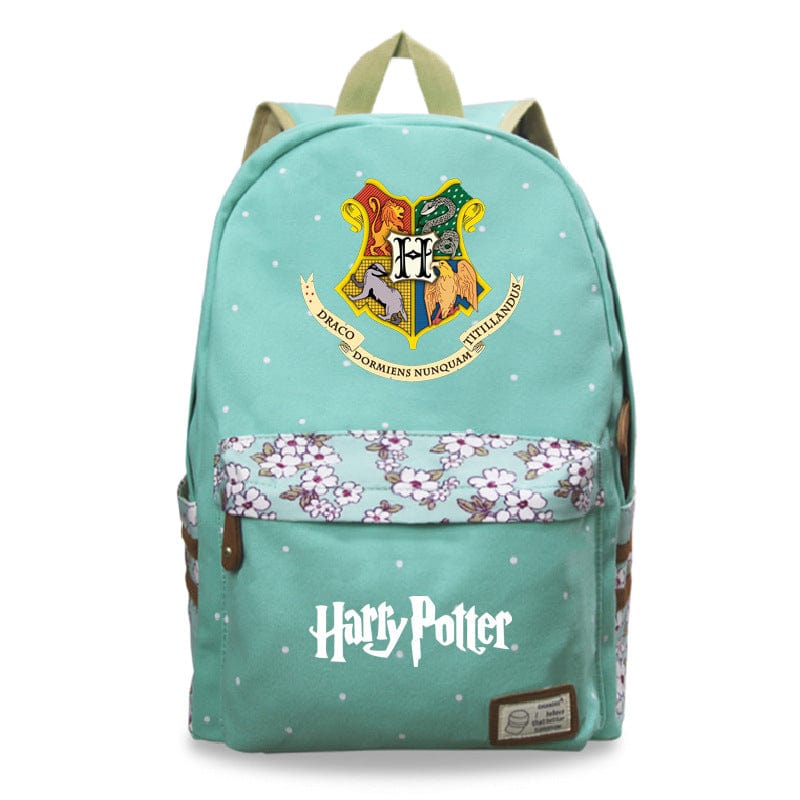 Sac à dos enfant fille Harry Potter lumineux, avec les emblèmes emblématiques de Poudlard.