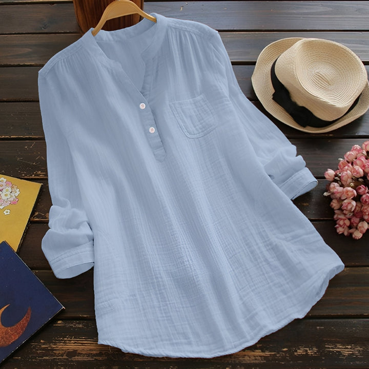 Blouse femme décontractée et confortable, idéale pour le quotidien ou le bureau. Style intemporel et polyvalent.