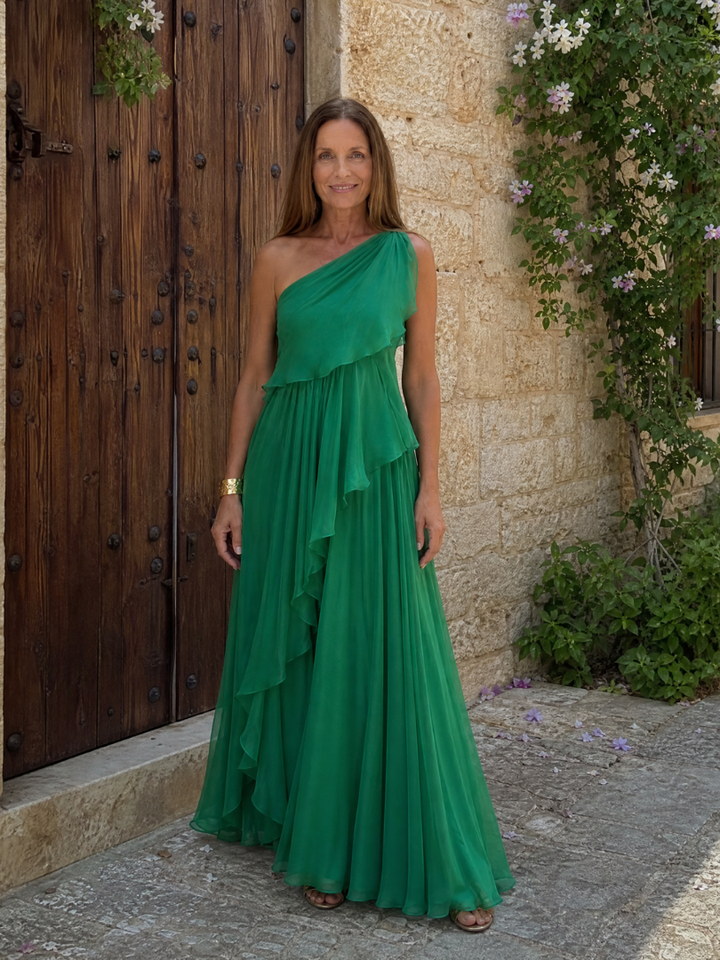 Robe femme habillée, maxi, avec coupe asymétrique et volants pour une touche unique.