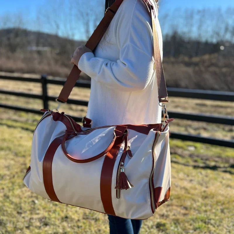 Sac de rangement pliable compact pour bagage, optimise l'espace et protège les vêtements sans plis.